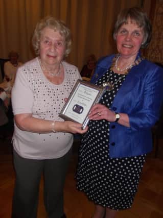 Federation Chairman, Elizabeth Warden; bestowing Honorary Membership to Lorna Walker who has been a member of Ballywalter WI for 59 years.