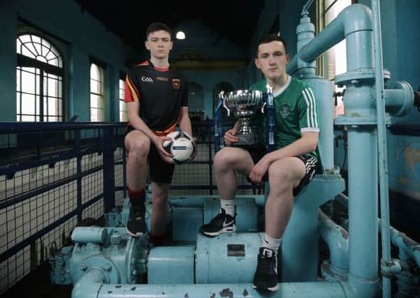 Captains Niall McParland (De La Salle College) and Bobby Burns (St Malachys).