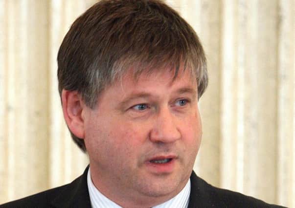 Basil McCrea told the Assembly he was leaving 'with his head held high'