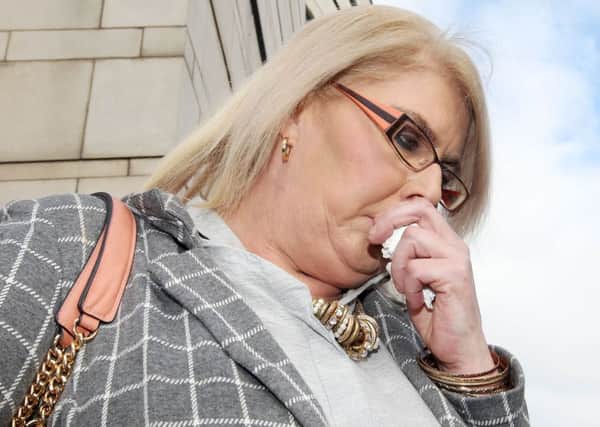 A distraught Arlene Arkinson's sister Kathleen walked out of Belfast Coroner's Court on Tuesday