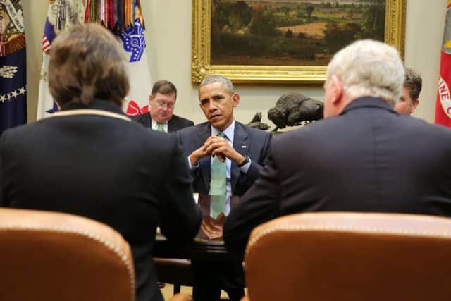 First Minister Arlene Foster and the deputy First Minister Martin McGuinness are pictured during their meeting with President Obama in the Roosevelt Cabinet Room of the White House.