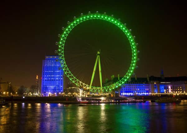 The Coca-Cola London Eye, on London's South Bank is lit green by Tourism Ireland to celebrate St Patrick's Day