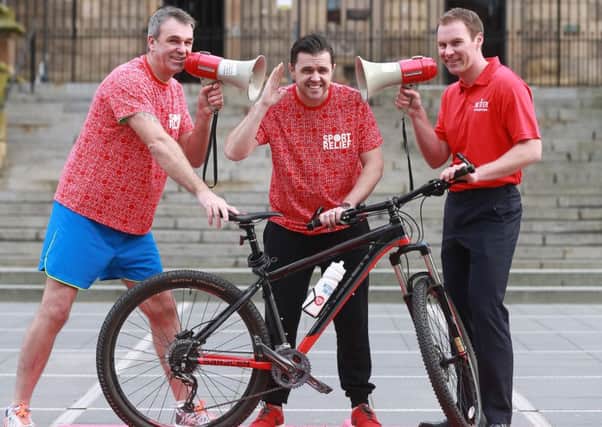 'Fitness Freddy' (left), Pete Snodden, and Gareth Kirk, Regional Director of official Sport Relief partner, Better Leisure Centres get into the spirit of Sport Relief