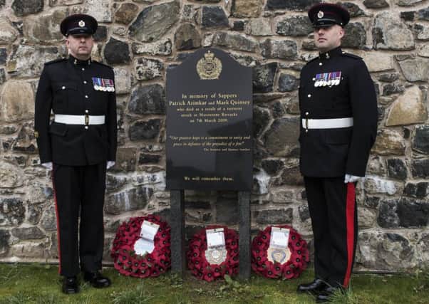 Staff Sergeant Manny Murray (left) and Warrant Officer Jules McCrea (right) at the memorial to the two Sappers who served with 38 Engineer Regiment.