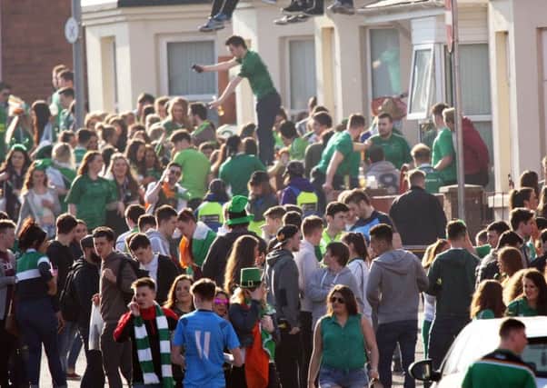 The Holylands area in south Belfast is thronged by hundreds of students and young people on Thursday