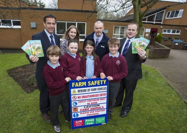 Pictured at the launch of a farm safety competition Ulster Bank is running in partnership with the Health and Safety Executive and AgriKids is (L-R) Ulster Bank's Senior Agriculture Manager, Cormac McKervey, AgriKids founder and author Alma Jordan, Health and Safety Executive Northern Ireland's Deputy Chief Executive, Bryan Monson and Wayne McCully, Branch Manager Ulster Bank Comber alongside P6 pupils from Andrews Memorial Primary School Luke Ritchie, Ruby Donaldson, Sarah Corken and Michael Gabbie.  Young people aged 7-16 are being invited to submit ideas for a story illustrating the potential dangers on a farm and how to stay safe, with the winning 4 entries to be published into a book of short stories that will be launched at this year's Balmoral Show. Further information and full details are available at: www.balmoralshow.co.uk