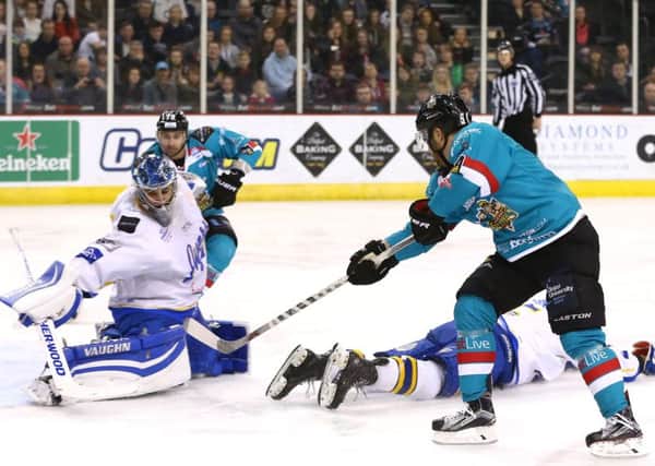 Belfast Giants' David Rutherford with Fife Flyers' David Brown
