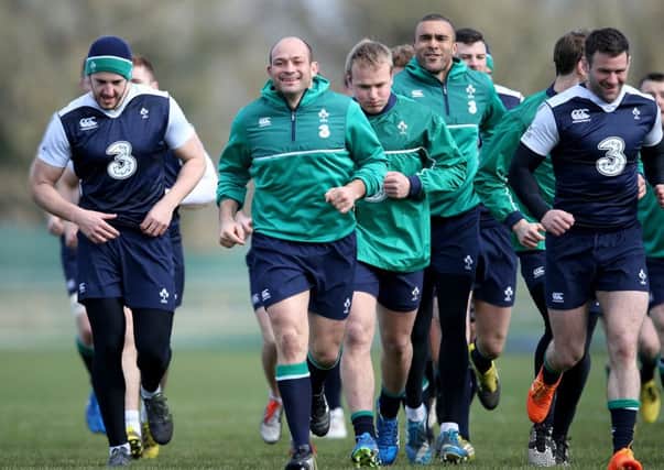 Rory Best leads the Ireland team during a training session