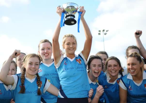 Ulster Elks Kirstie Lammey and her teammates celebrate winning the Irish Senior Cup