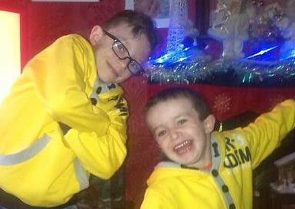 Brothers Evan (right) and Mark McGrotty were among the five people who died in the tragedy