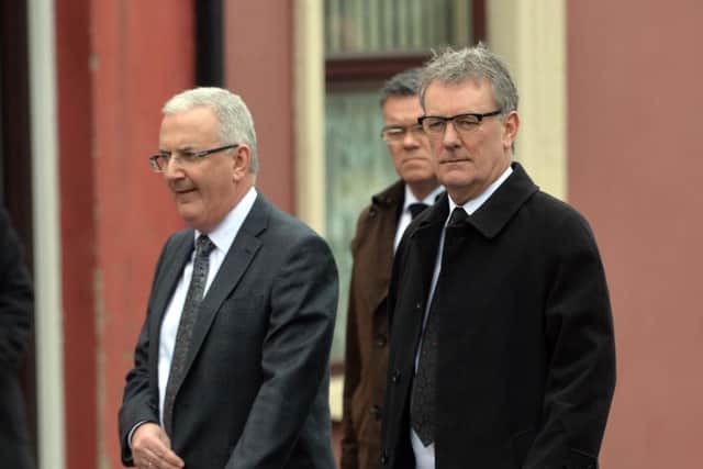 Ulster Unionist leader Mike Nesbitt and party colleague Danny Kennedy at the funeral for murdered prison officer Adrian Ismay arrives at Woodvale Methodist Church this morning