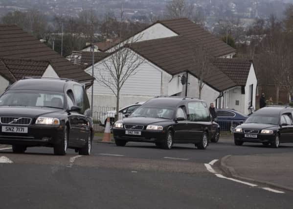 The cortege of hearses bringing the victims home to Londonderry