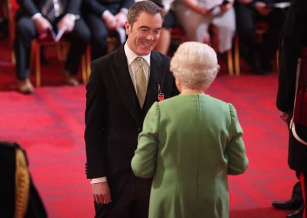Actor James Nesbitt is made an OBE (Officer of the Order of the British Empire) by Queen Elizabeth II during an Investiture ceremony at Buckingham Palace
