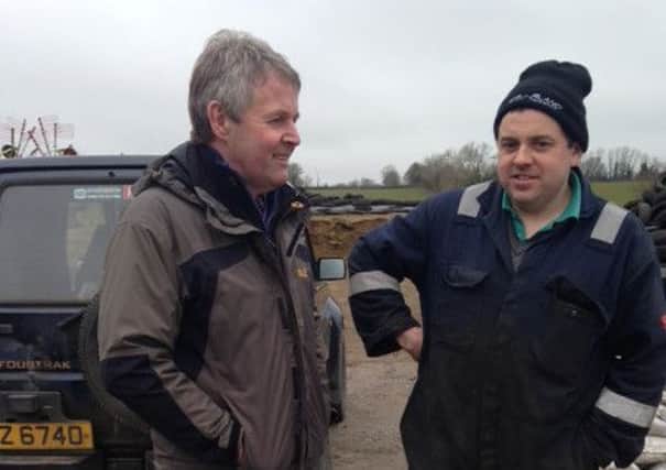 Pictured discussing the winter floods is UFU deputy president, Barclay Bell and Roy Allen