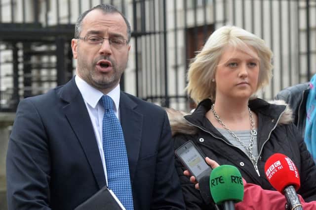 Patrick Corrigan of Amnesty International supports Sarah Ewart  outside Belfast High Court after a hearing on current abortion legislation