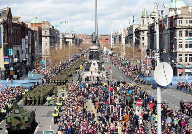 Handout photo issued by the Defence Forces of marching elements comprised of personnel drawn from Army, Air Corps, Naval Service, reserve Defence Forces, Defence Forces Veterans, and selected Emergency Services as they 
march along O'Connell Street, as part of the 1916 Easter Rising centenary commemorations in Dublin