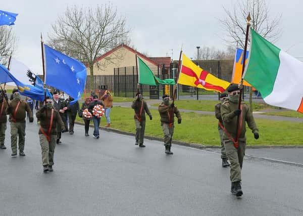 A Republican Sinn Fein commemorative march makes its way from the Kilwilkee estate to St Colemans Cemetery. Photo: Kevin Scott / Presseye