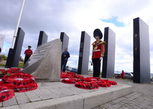 Wreaths were laid at the towns war memorial during the Junior Orange Easter Tuesday demonstration in Carrickfergus