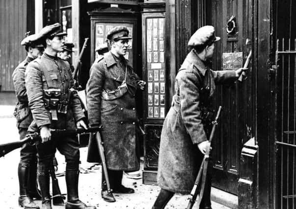 British soldiers breaking in the doors of a house so as to be able to cut off rebels in the Gresham Hotel in 1916