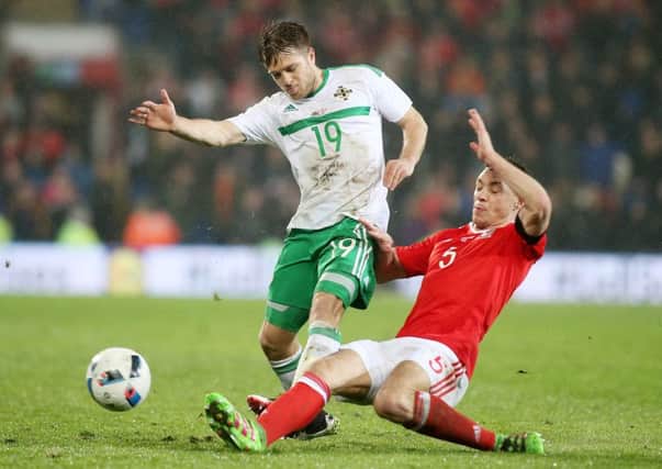Jamie Ward (left) in action against Wales