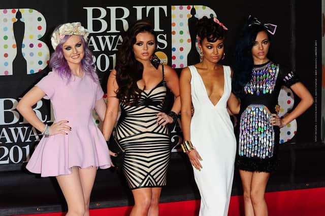 Little Mix arriving for the 2013 Brit Awards at the O2 Arena, London.  Photo: Ian West/PA Wire