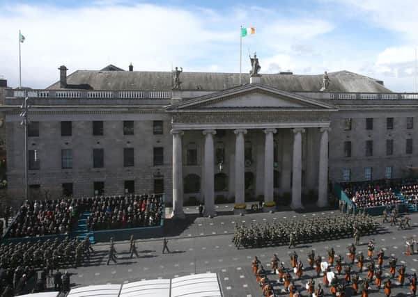 The largest military parade in the history of the Republic passes the GPO as part of the 1916 Easter Rising centenary commemorations in Dublin on Easter Sunday 2016. Photo credit: Niall Carson/PA Wire