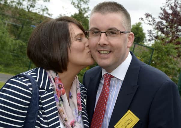 Cusher Independent candidate Paul Berry gets a congratulatory kiss from wife Lorna on his election in 2014 Â© Edward Byrne Photography