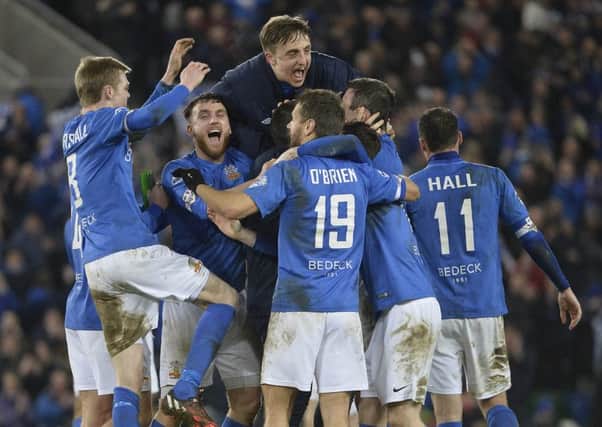 Glenavon's match winner Kevin Braniff celebrates with team mates at the final whistle