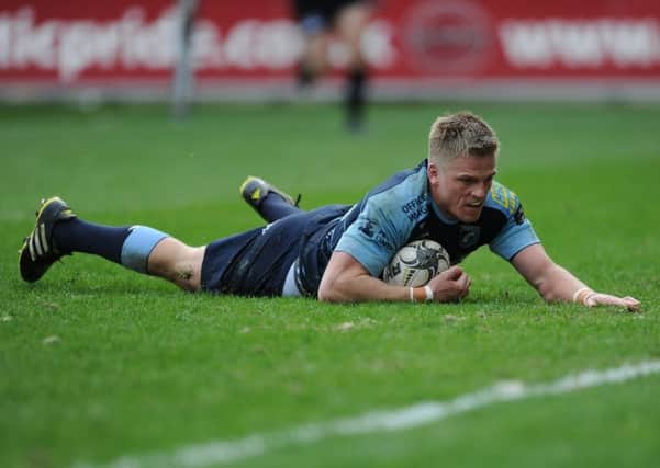 Cardiff Blues' Gareth Anscombe scores his side's third try against Scarlets