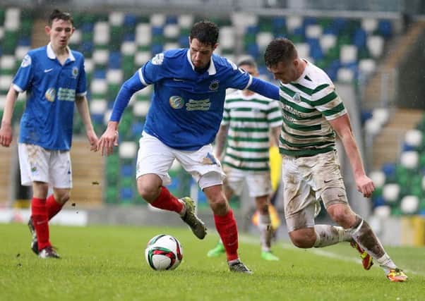 Linfield's Sean Ward and Lurgan Celtic's Dale Malone
