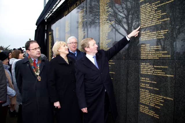 Taoiseach Enda Kenny (right) Minister for Arts, Heritage and the Gaeltacht, Heather Humphreys (third right) Councillor Ruairi McGinley (fourth right) and John Green, Glasnevin Trust Chairman (second right) at the unveiling of the Necrology Wall at Glasnevin Cemetery in Dublin. Photo credit: Lensmen/PA Wire