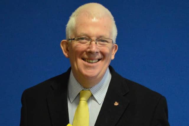 East Antrim Alliance candidate Stewart Dickson has been returned safely