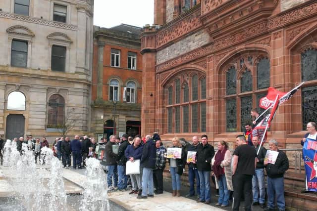 The protesters outside the Guildhall calling for the immediate release of local man Tony Taylor.