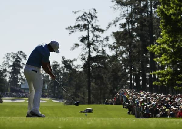 Rory McIlroy tees off on the seventh hole during a practice round at Augusta