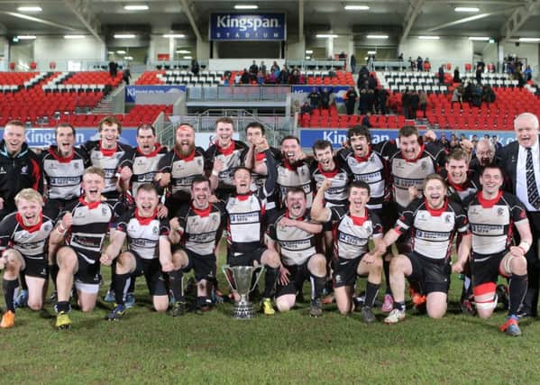 Cooke celebrate after they defeated Malone II in the final at Kingspan Stadium
