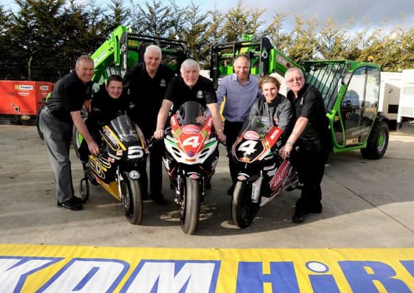 Gary Dunlop and Malachi Mitchell-Thomas pictured with Cookstown Club members Noel Henderson, Norman Crooks, Kenny Loughrin, and George Young plus KDM Hires Michael Millar.