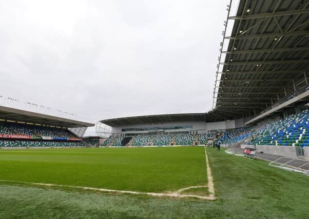 The teenager is accused of letting off the flare at last month's game between Linfield and Glentoran at Windsor Park
