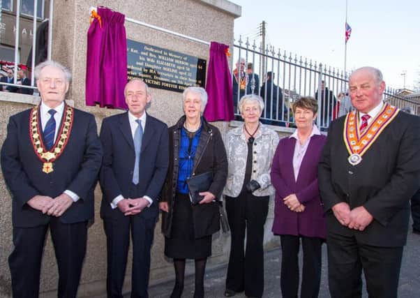At the dedication of a memorial tablet at Dromore Orange Hall to mark the 40th anniversary of the Herron family atrocity are relatives of the deceased, Alistair Herron (son), Carol Mackey and Joy Bingham (daughters) and Sally Herron (daughter-in-law). Also pictured are the Grand Master of the Grand Orange Lodge of Ireland, Edward Stevenson, and Sovereign Grand Master of the Royal Black Institution, Millar Farr