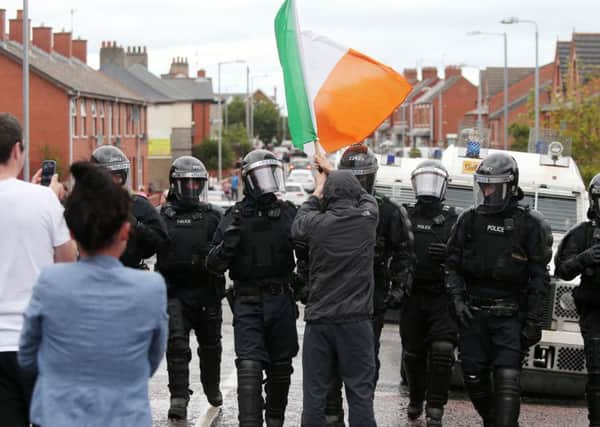 Nine PSNI officers were injured in the riots