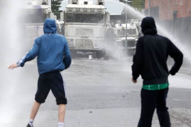 Police had to deploy water cannon during last summer's anti-internment rally