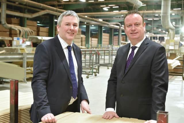 SAM Mouldings MD Richard Holmes. left, with Manufacturing Northern Ireland CEO Stephen Kelly