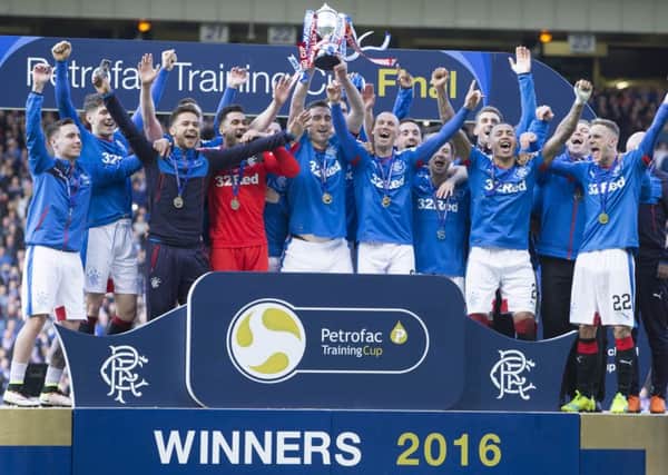 Rangers players celebrate winning the Petrofac Training Scottish Cup