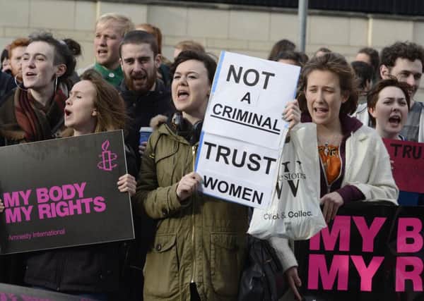 Protesters outside the Public Prosecution Service earlier this month after a woman appeared in court charged with inducing her own abortion.