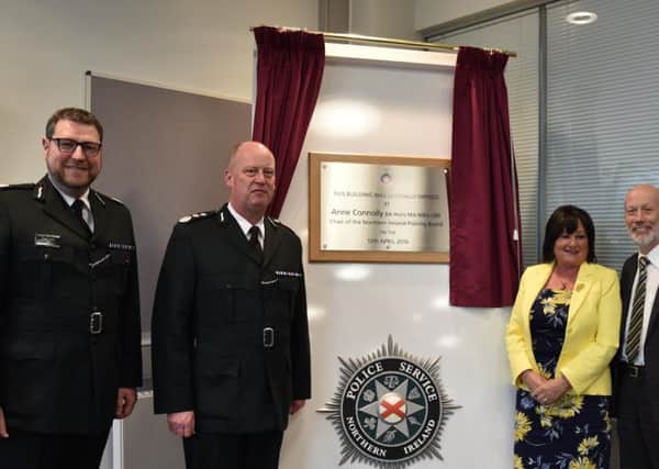 PSNI Assistant Chief Constable Stephen Martin, PSNI Chief Constable George Hamilton, Chair of Northern Ireland Policing Board Anne Connolly and Justice Minister David Ford attend the official opening of Downpatrick Police Station