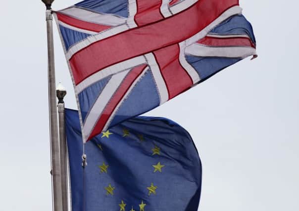 File photo dated 01/03/16 of the Union Jack (top) pictured next to the European Union flag