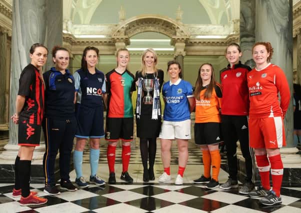 Nicola McCleery (Danske Bank) and Maura Muldoon (Chairperson of the Women's Premiership Committee) are pictured with some of the players at the launch of the Danske Bank Women's Premiership