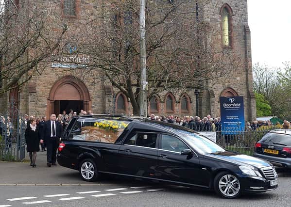 Maureen Buchanan's cortege leaves Bloomfield Presbyterian Church after her funeral service