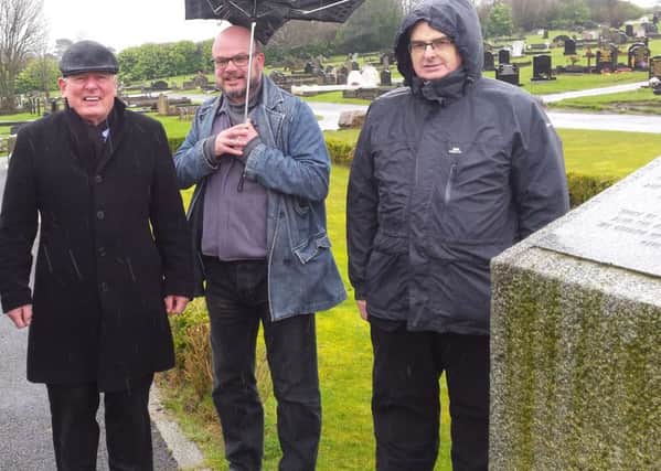 Councillors Jeff Dudgeon, David Armitage, Pat Convery at the City Cemetery memorial to the unidentified Belfast Blitz victims. April 10 2016