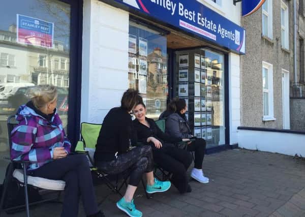 Four people started queueing outside Cookstown estate agents, Stanley Best, days before the sale of seven homes