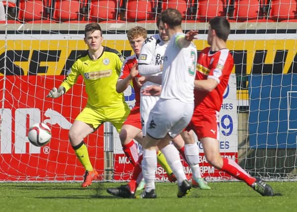 Marcus Kane scores the opener at Solitude